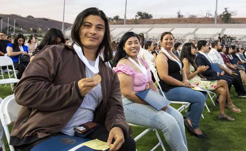 Students show off their Transfer Medallions